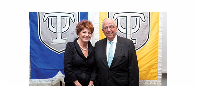 From left, Pierrette Phillips congratulates Dr. Raoul Rodriguez, who was invested as the inaugural holder of the Pierrette and John G. Phillips Professorship in Orthopaedics at the School of Medicine on November 13. 