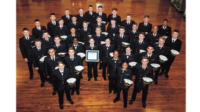 Tulane’s Navy ROTC Unit in uniform gathers in the lobby of the Navy ROTC building on Freret Street on the uptown campus for a group photo.