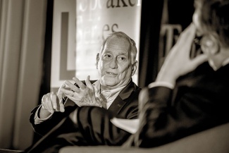 Walter Isaacson and President Michael A. Fitts in discussion at the Presidential Speaker Series