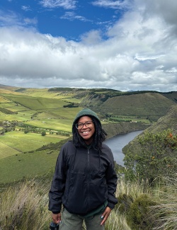 Treasure Joiner in Ecuador on a hill with a ranforest valley in background