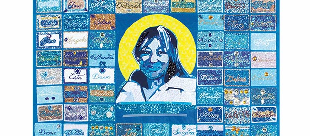 The Life Quilt (2018), sewn together by Louise Mouton Johnson, features the names of 107 women serving life sentences. The names were compiled by Selina Anderson of the Louisiana Correctional Institute for Women Drama Club and hand-beaded by members of Black Masking Indian gangs. The center portrait is of lifer Mary Turner by Brandan “BMike” Odums. (Photo courtesy Newcomb Art Museum)