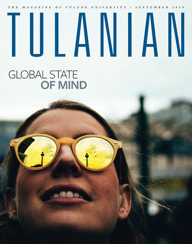September 2019 cover image of girl with mirrored sunglasses on