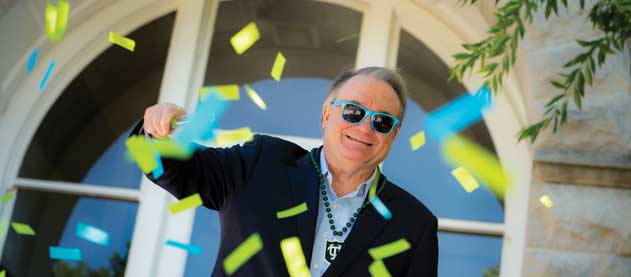 photo of President Mike Fitts with confetti and sunglasses