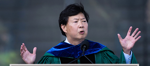Ken Jeong gives a speech from the stage 