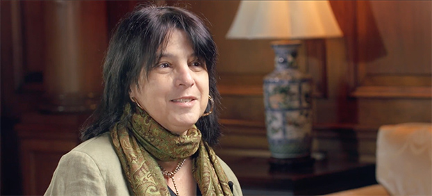 Lisa Fauci sits and talks to an interviewer