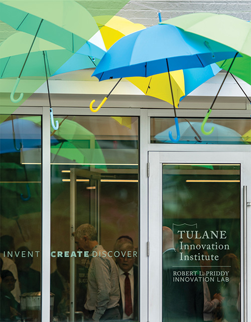 Innovation Institute exterior with colorful umbrellas decorating doorway