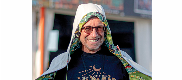 Bud Brimberg in front of Jazz Fest merchandise tent