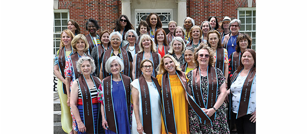 group of women from the Newcomb College Class of 1974 pose for group photo to celebrate their 50-year reunion