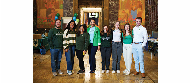 A group of Tulane Legislative Scholars pose in their Tulane gear during the event