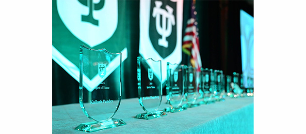 row of glass awards on a table