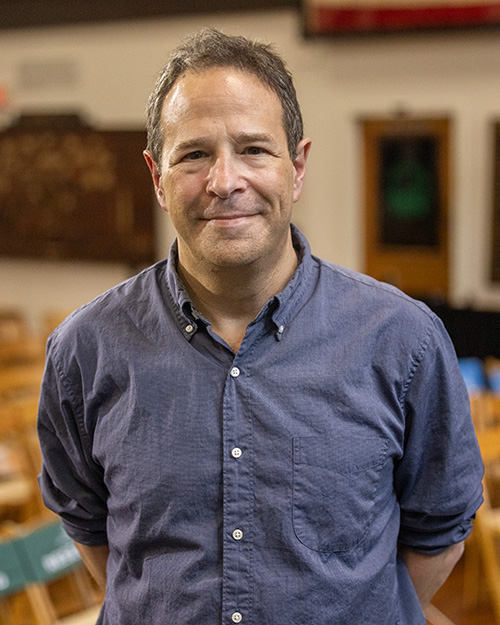 Rich Cohen stands and wears a blue shirt at Tulane University during Book Fest