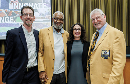 Pictured from left to right, Tulane Professor Scott Grayson, Pro Football Hall of Famer Bobby Bell, author Erin Grayson Sapp and Hall of Famer Ron Mix at a Tulane Center for Sport event.