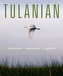 Tulanian Fall 2021 cover with photograph of egret flying over a marsh