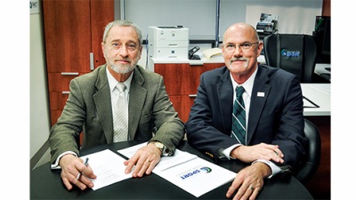 Dr. James Kelly, Avalon Fund representative, and Tulane’s Dr. Greg Stewart sign the agreement for the creation of the Center for Brain Health.