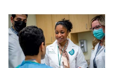 Professor of surgery at Tulane Medical center Jaquelyn S. Turner sees a patient