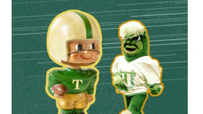 Historic mascots Greenie, little boy in football gear; and Gumby, tall with green fur