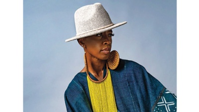 Portrait of dancer Michelle Gibson wearing a hat