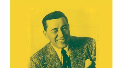 stylish and charming Louis Prima winks in an old photo