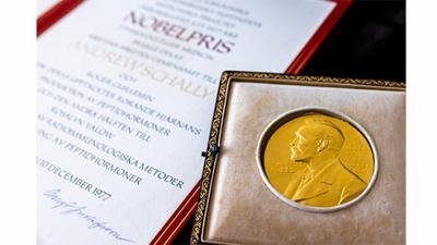 gold Noble Prize medal in velvet case