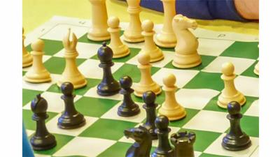 close up of green and white chess board