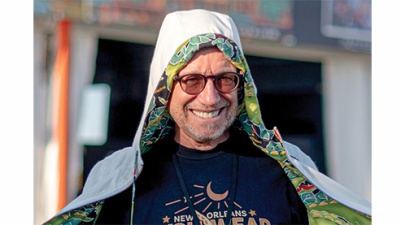 Bud Brimberg in front of Jazz Fest merchandise tent