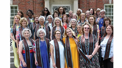 group of women from the Newcomb College Class of 1974 pose for group photo to celebrate their 50-year reunion