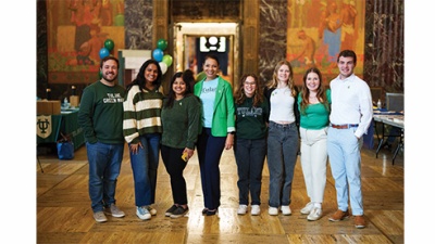 A group of Tulane Legislative Scholars pose in their Tulane gear during the event