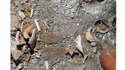 relics in excavation site of an ancient Maya tomb 