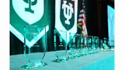 row of glass awards on a table
