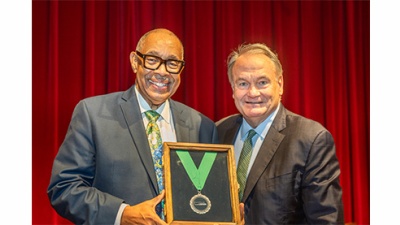 Dr. Michael White receives medal from President Fitts Dr. Michael White receives the Tulane Trailblazer medal from President Michael A. Fitts