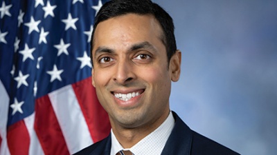 Representative Suhas Subramanyam Representative Suhas Subramanyam portrait with American flag in the background