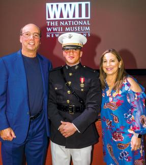 Tulane parents Stuart and Suzanne Grant, pictured with their son Sam in U.S. Marine Corps uniform