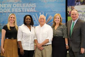 Book Fest team members: Allison Hjortsberg, Lindsey Billips, Walter Isaacson and Cheryl Landrieu with Tulane President Mike Fitts 