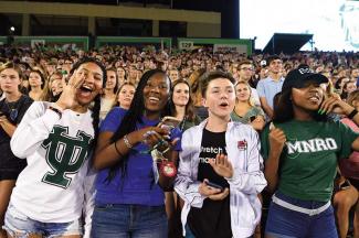 Incoming students cheer at an Orientation pep rally in Yulman Stadium on Aug. 23, 2018.