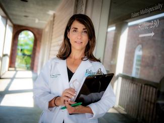 Dr. Michele Longo stands outside of the Tulane Multispecialty Clinic.