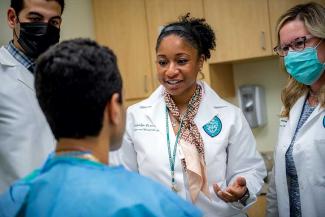 Professor of surgery at Tulane Medical center Jaquelyn S. Turner sees a patient
