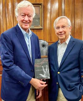 Bill Smith and William Rawlings pose with their book.
