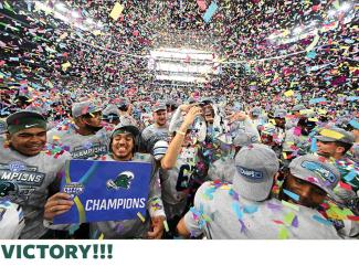 Team members celebrate the Cotton Bowl championship with swirling confetti 