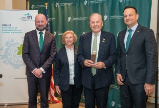 At the Irish Embassy in Washington, D.C., the Irish Taoiseach Leo Varadkar presents the Science Foundation Ireland award to Whelton.