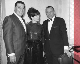 dressing room photo of Prima and Gia with Frank Sinatra (wearing a tux)