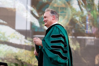 President Fitts in academic regalia at the 2024 Unified Commencement 