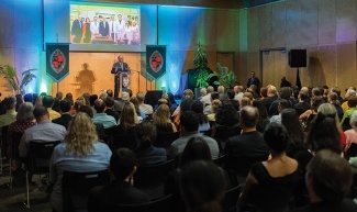 audience listens to President Fitts' State of the University presentation