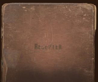 old family recipe book with a worn brown cover. The cover reads “Receptek,” Hungarian for “recipes.” 