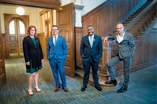 picture of the four new deans inside Gibson Hall.