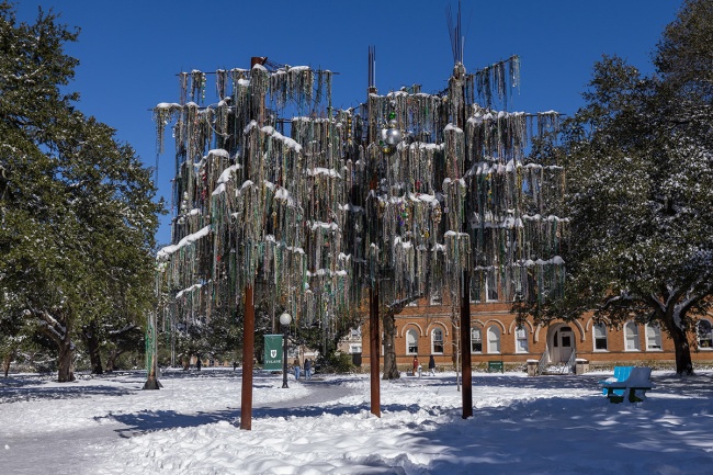 snow covers the ground and Bead Three sculpture on a sunny day